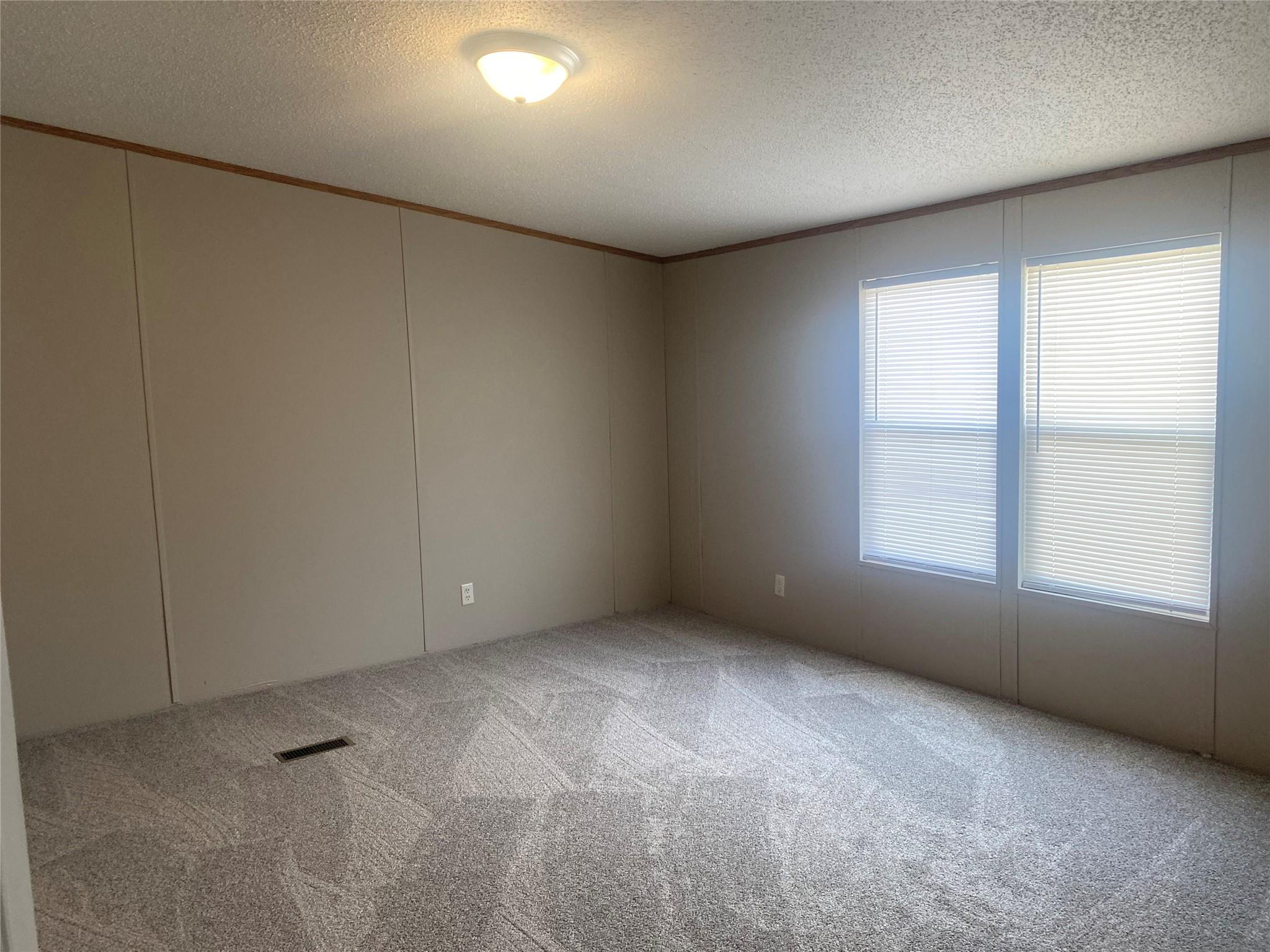 180 Tryon Road Rockwell, NC 28138 - Photo 19 of 31 an empty room with a window