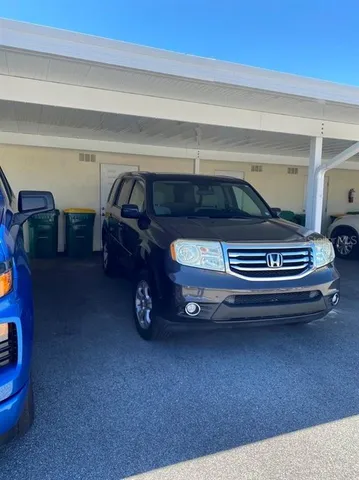 a view of swimming pool from a balcony