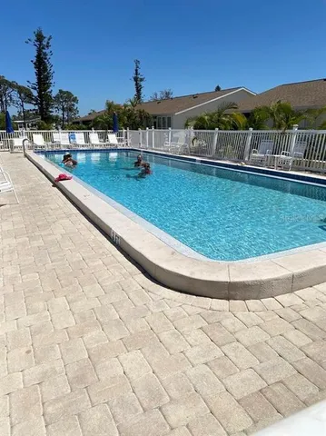 a view of a car parked in front of a house