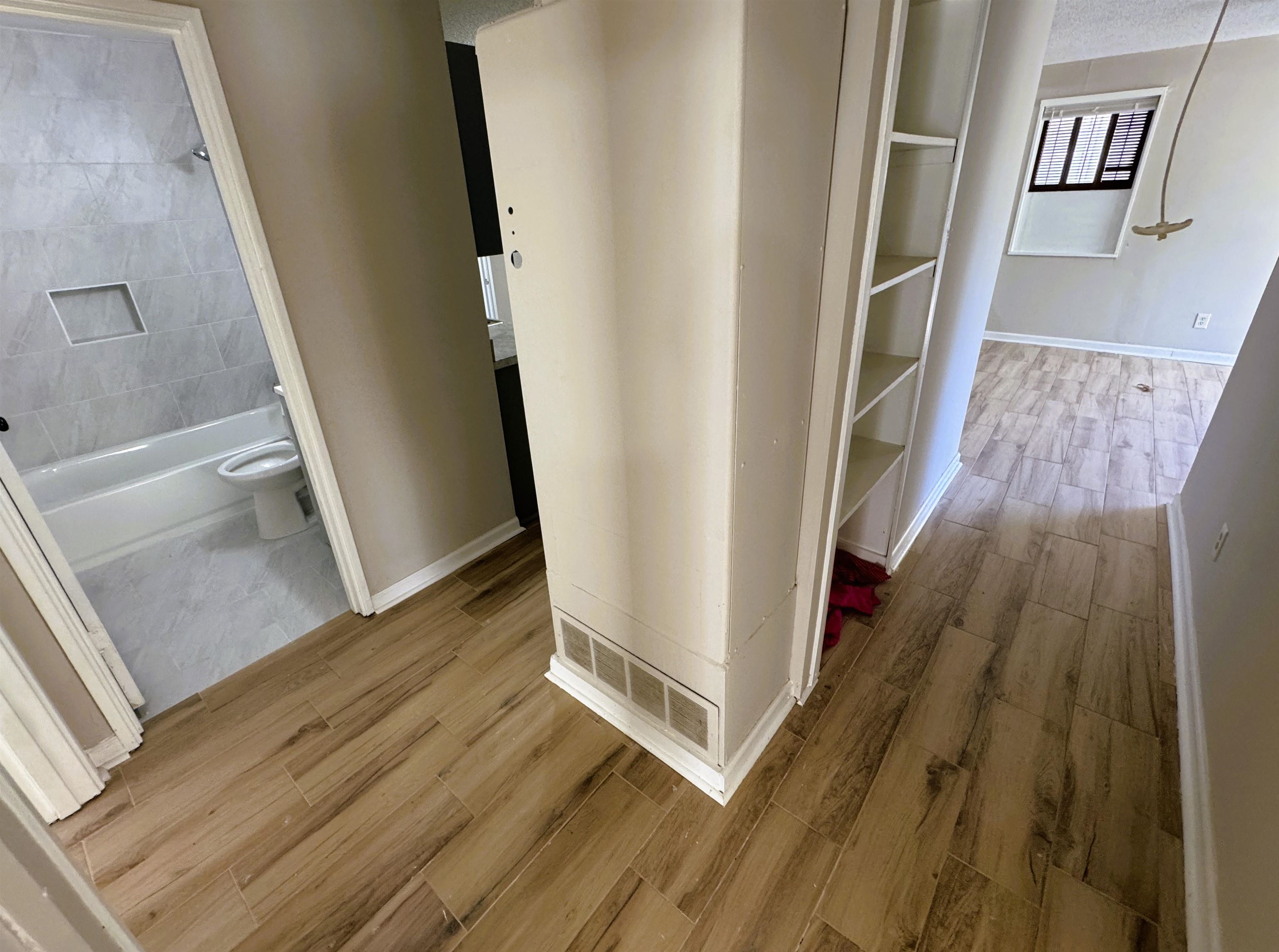 961 North Perkins Road Memphis, TN 38122 - Photo 6 of 15 Hallway with wood tiled floors and baseboards