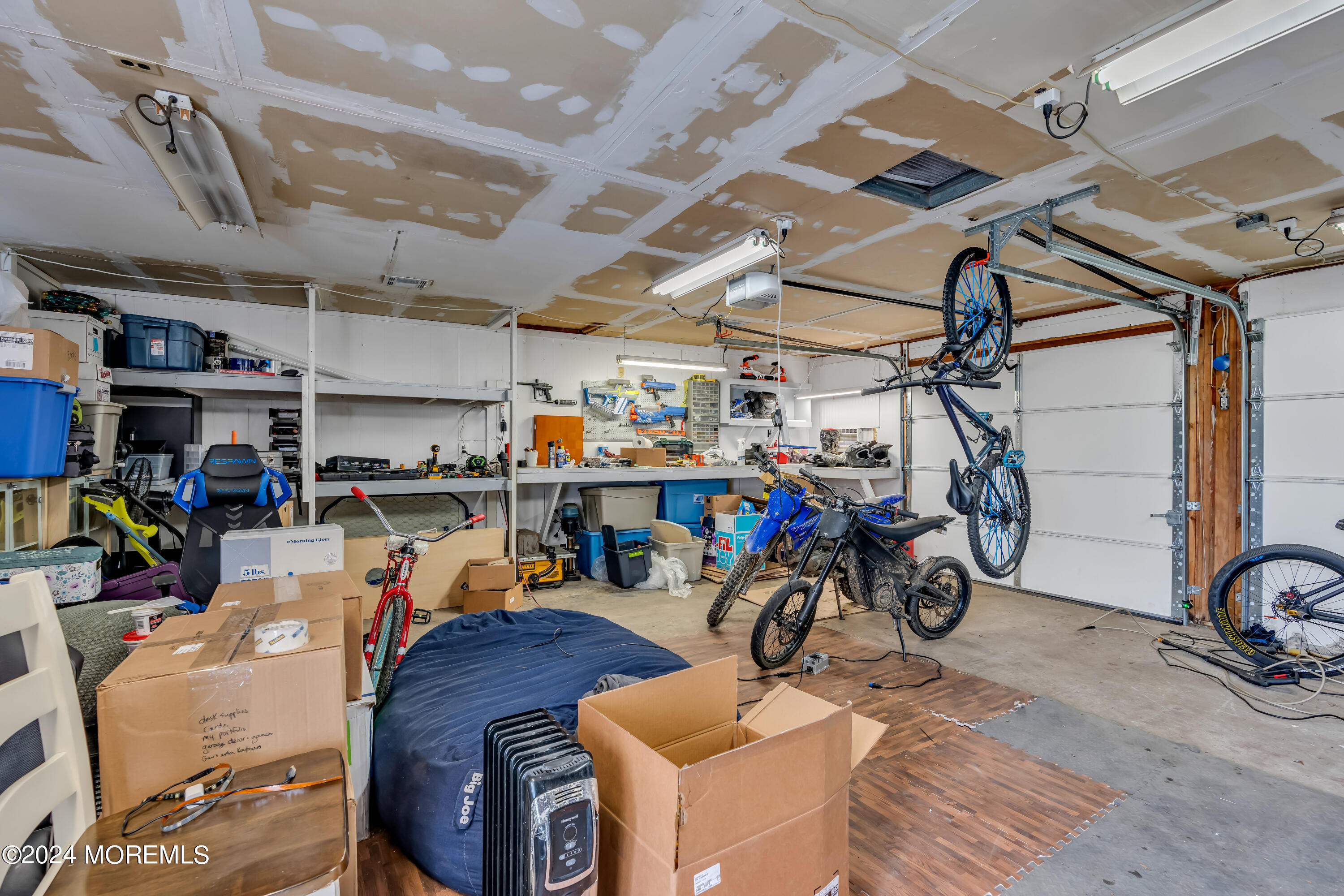 4 Fern Road Howell, NJ 07731 - Photo 28 of 46 a view of a storage room with bicycles