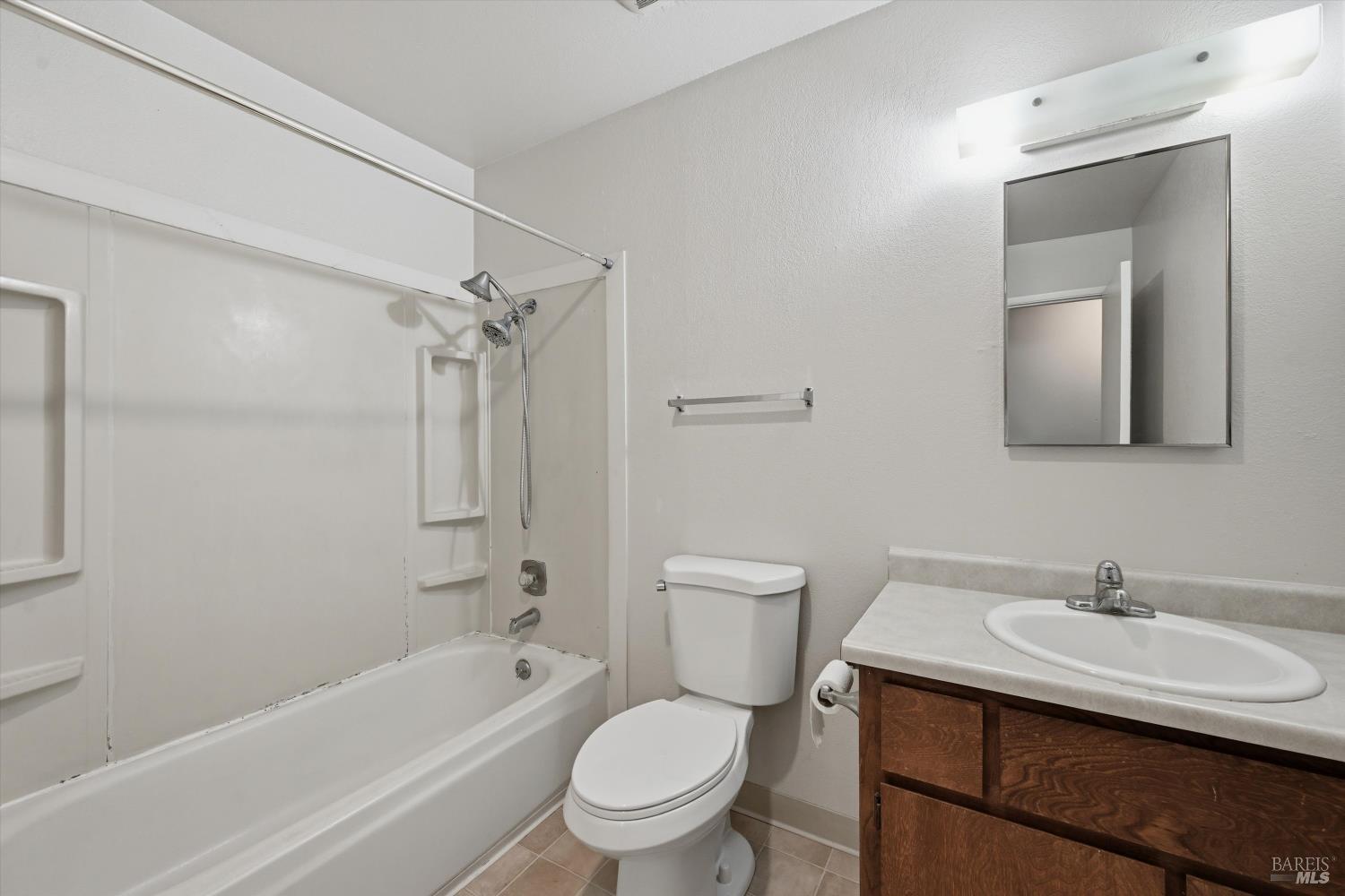 498 Santa Alicia Drive Rohnert Park, CA 94928 - Photo 12 of 18 a bathroom with a sink toilet vanity and shower