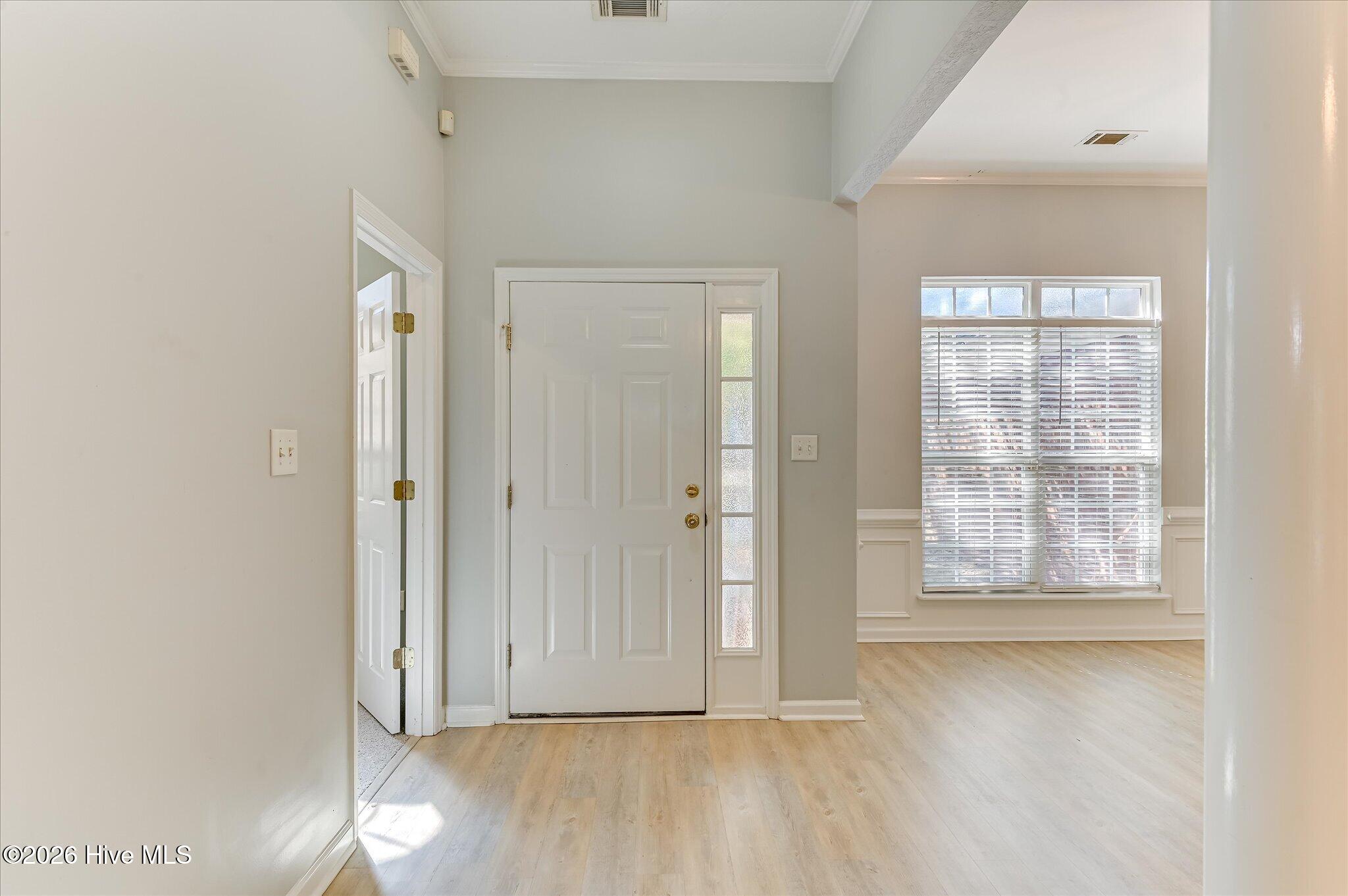 643 Butler Springs Circle Grovetown, GA 30813 - Photo 2 of 29 Entry Door, dining room window on right (in picture) and door to primary bedroom on left (in picture)