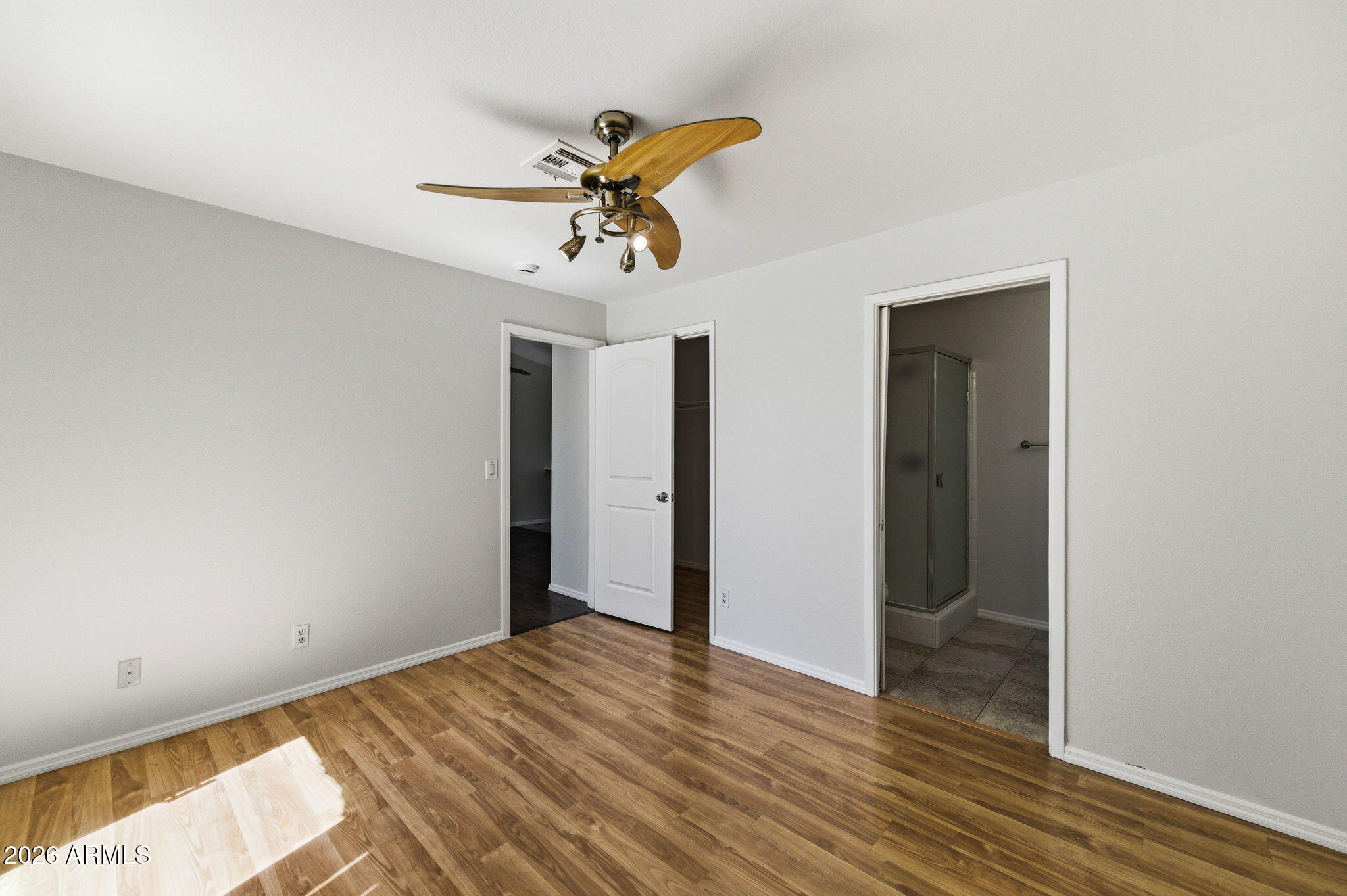 653 West Guadalupe Road, Unit 2015 Mesa, AZ 85210 - Photo 9 of 23 Primary Bed and Closet