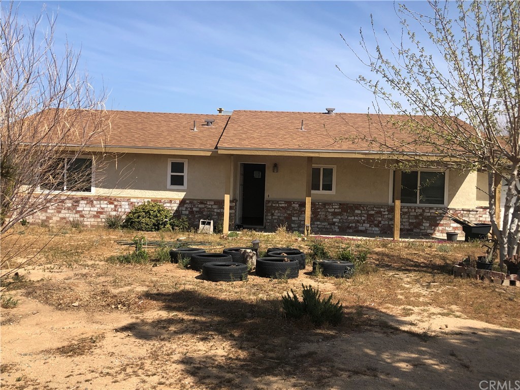 21170 Geronimo Road Apple Valley, CA 92308 - Photo 1 of 1 a view of a house with backyard