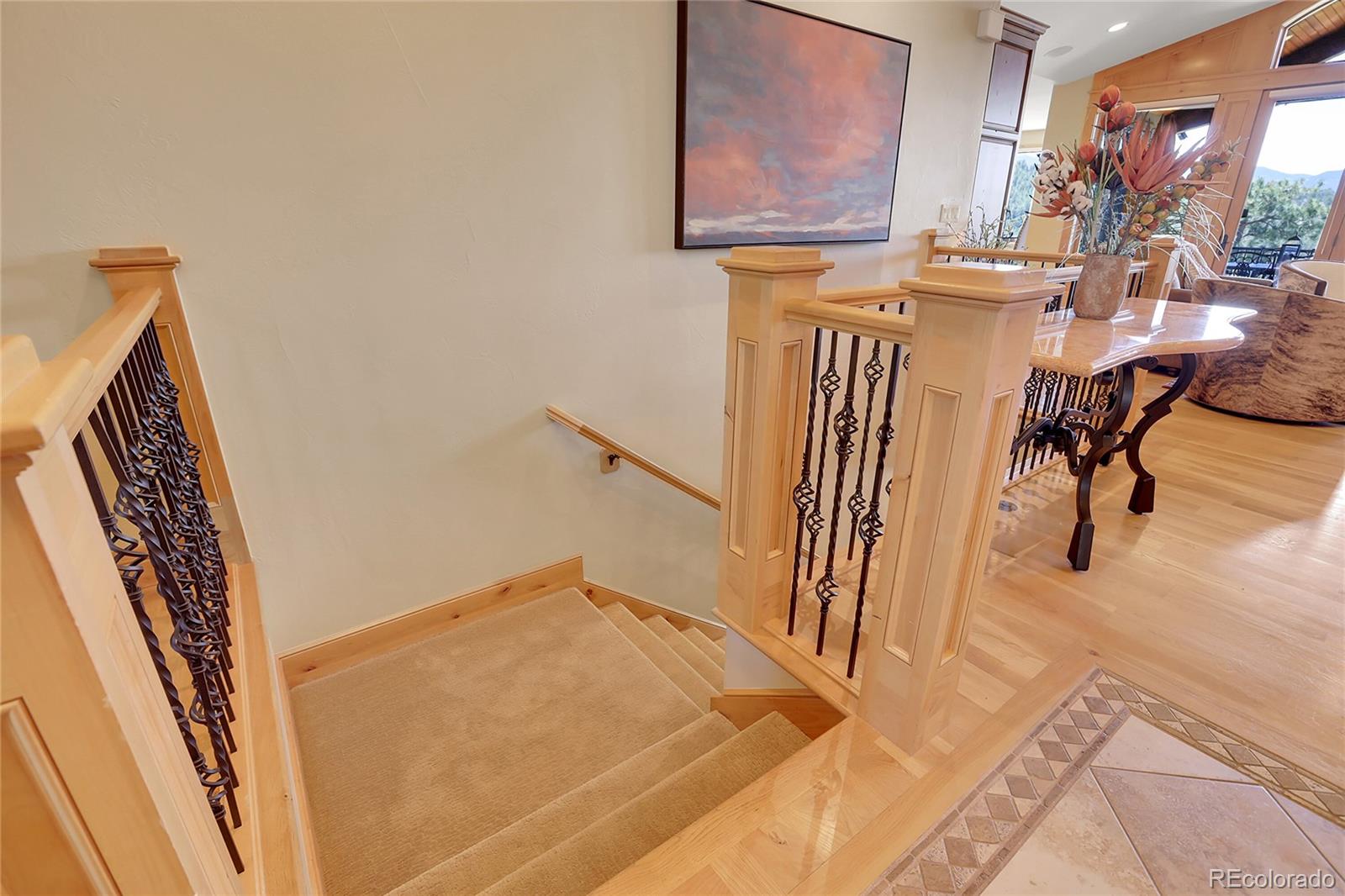 1007 Nob Hill Road Evergreen, CO 80439 - Photo 29 of 48 a view of a hardwood & staircase