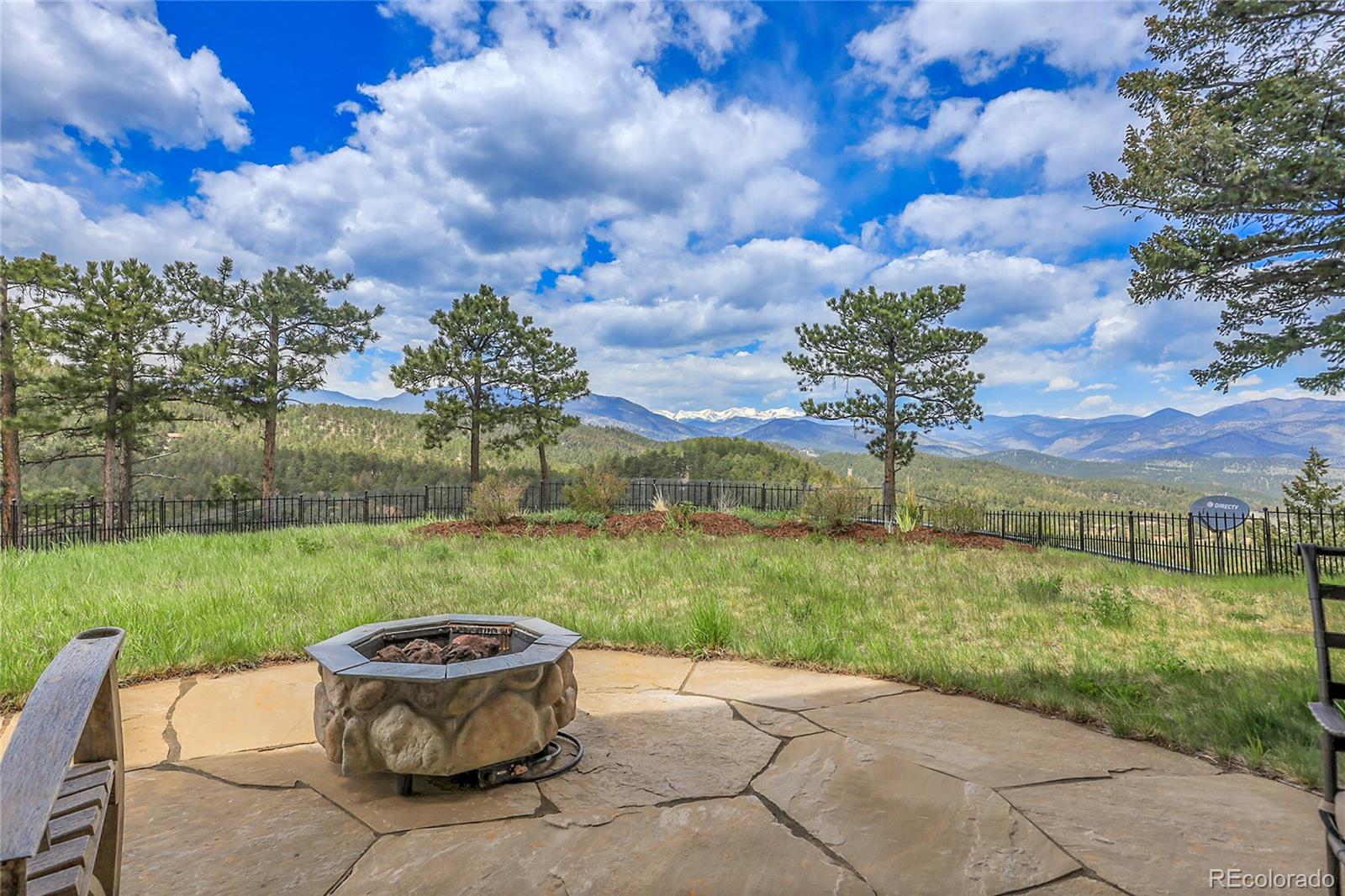 1007 Nob Hill Road Evergreen, CO 80439 - Photo 35 of 48 a view of a garden with an outdoor seating