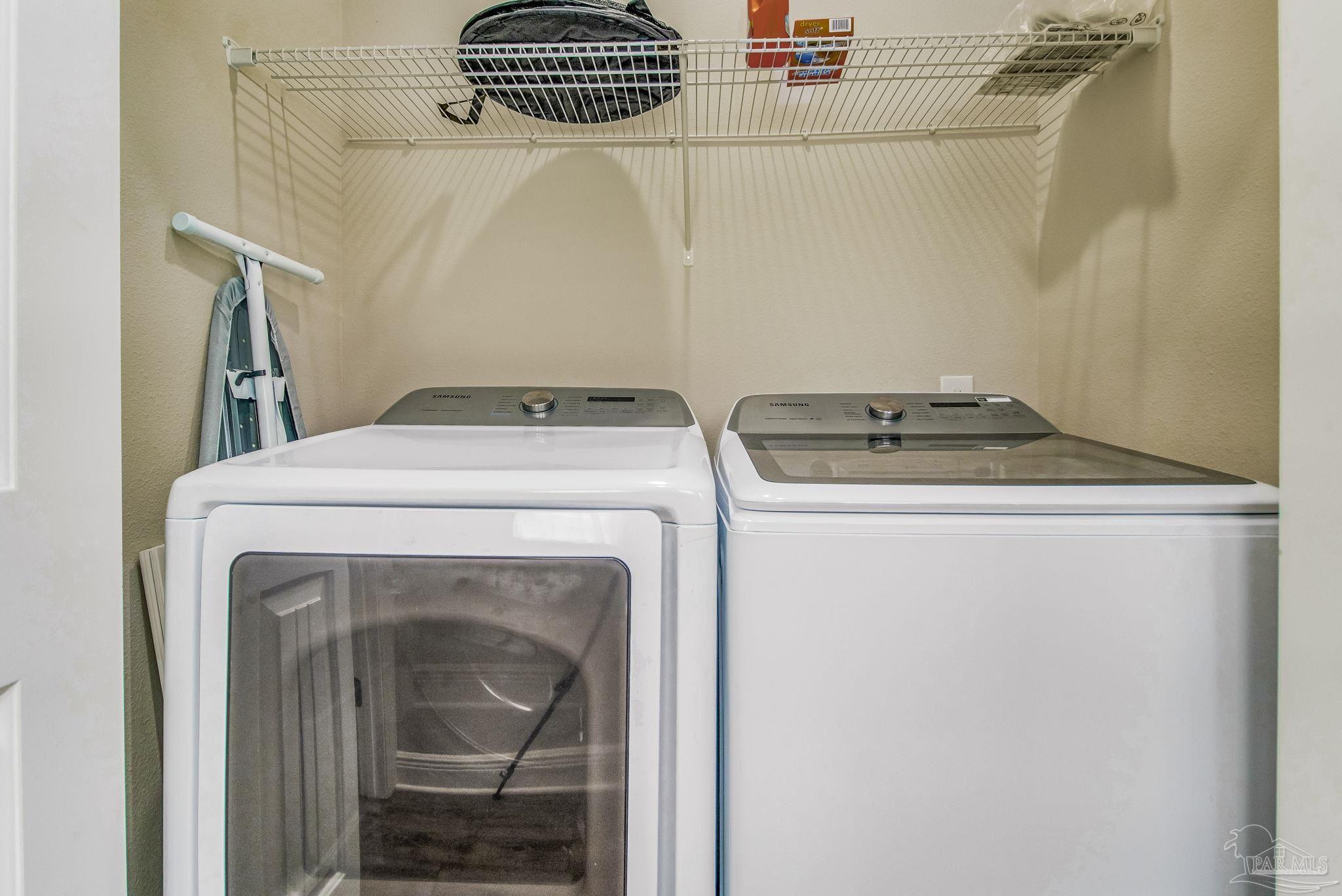1002 West Main Street Pensacola, FL 32502 - Photo 32 of 32 a utility room with dryer and washer