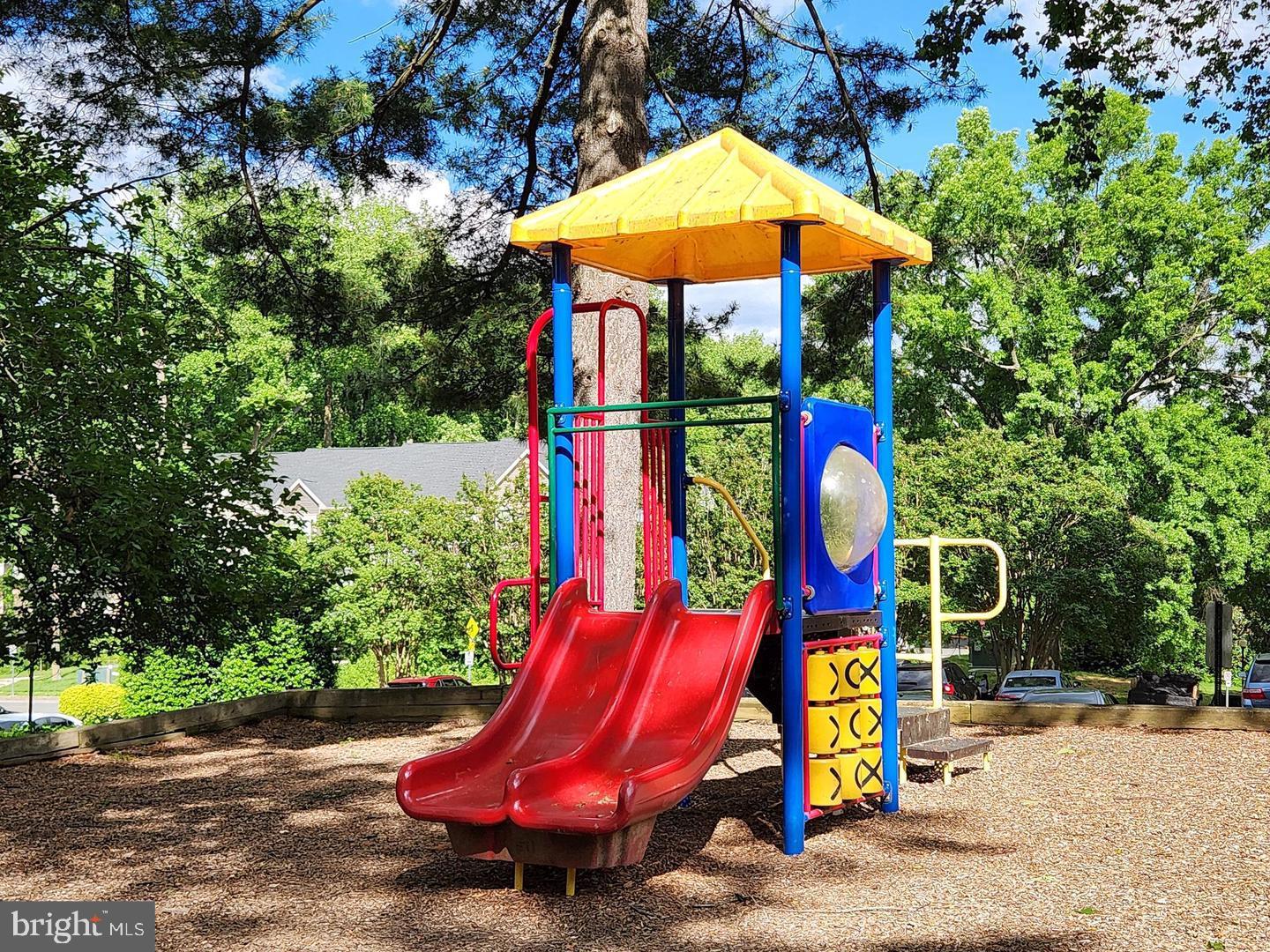 7904 Inverton Road, Unit 204 Annandale, VA 22003 - Photo 23 of 24 an outdoor space with chairs and umbrellas