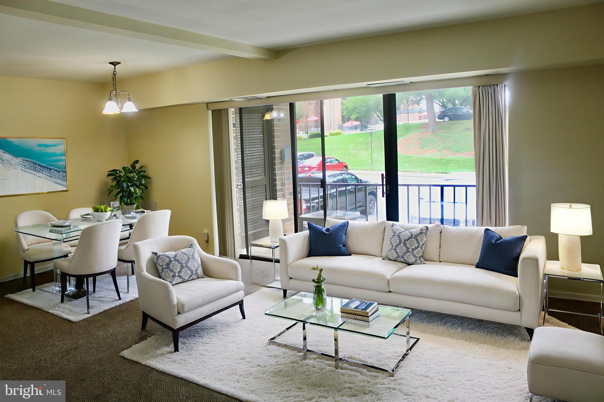 7904 Inverton Road, Unit 204 Annandale, VA 22003 - Photo 3 of 24 a living room with furniture and a large window