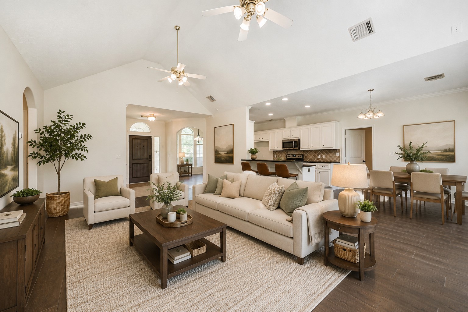 27322 Afton Way Huffman, TX 77336 - Photo 4 of 50 *Virtually staged - Open-concept layout offers spacious living and entertaining areas with vaulted ceilings, durable wood-look flooring, and a welcoming flow throughout.
