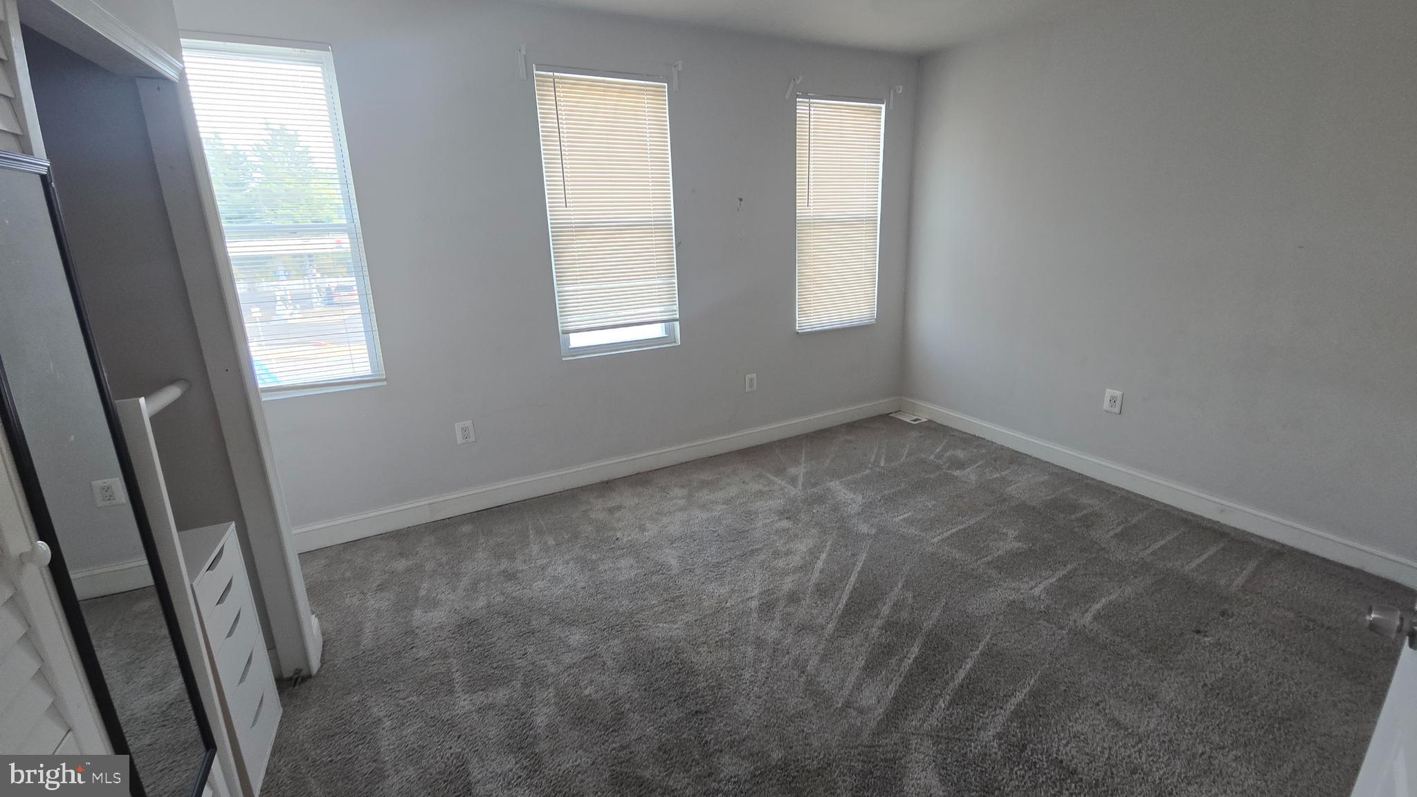 6814 Harford Road Baltimore, MD 21234 - Photo 14 of 27 an empty room with windows