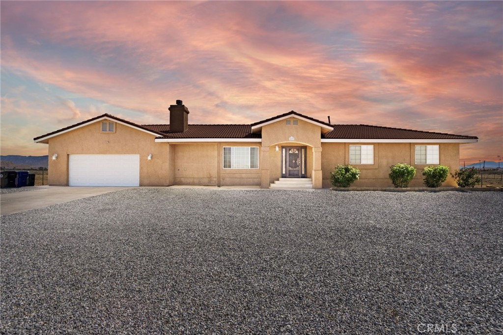 front view of a house with a street