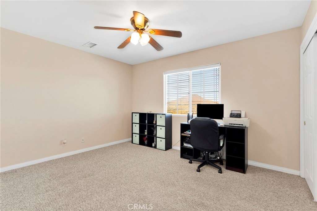 21237 S Road Apple Valley, CA 92307 - Photo 29 of 50 a view of workspace with a window