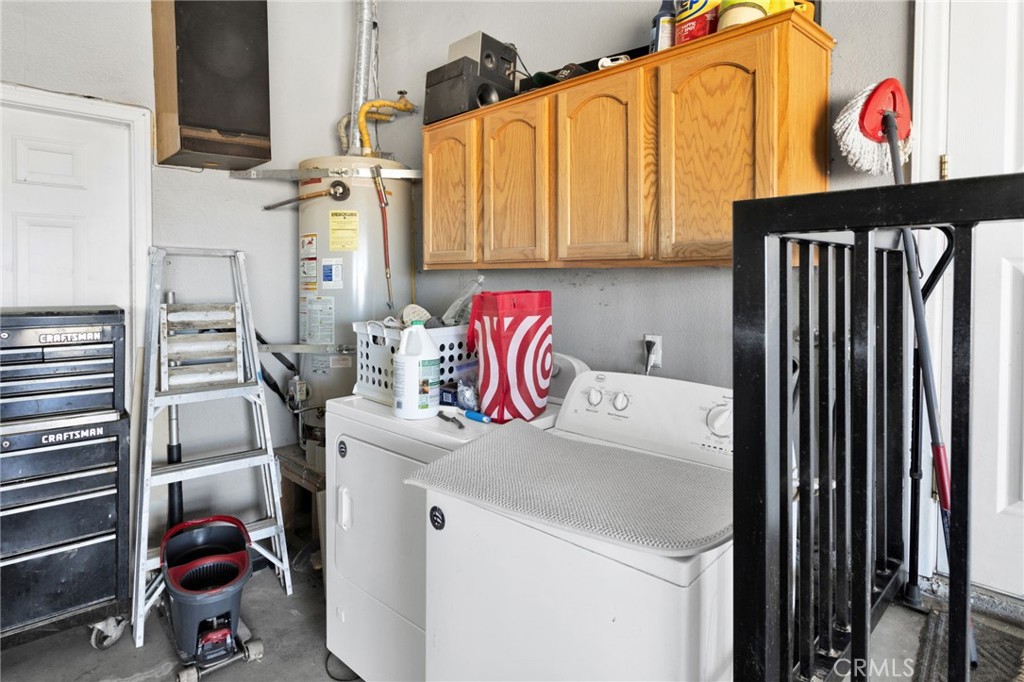 21237 S Road Apple Valley, CA 92307 - Photo 32 of 50 a utility room with dryer and washer