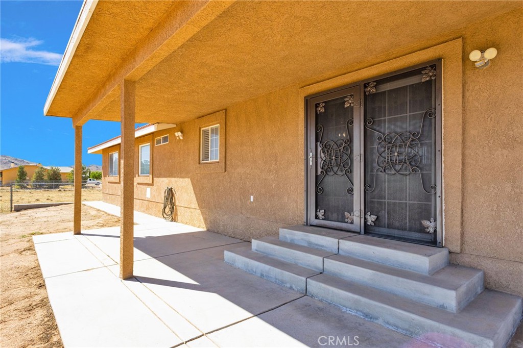 21237 S Road Apple Valley, CA 92307 - Photo 34 of 50 a view of a entryway door