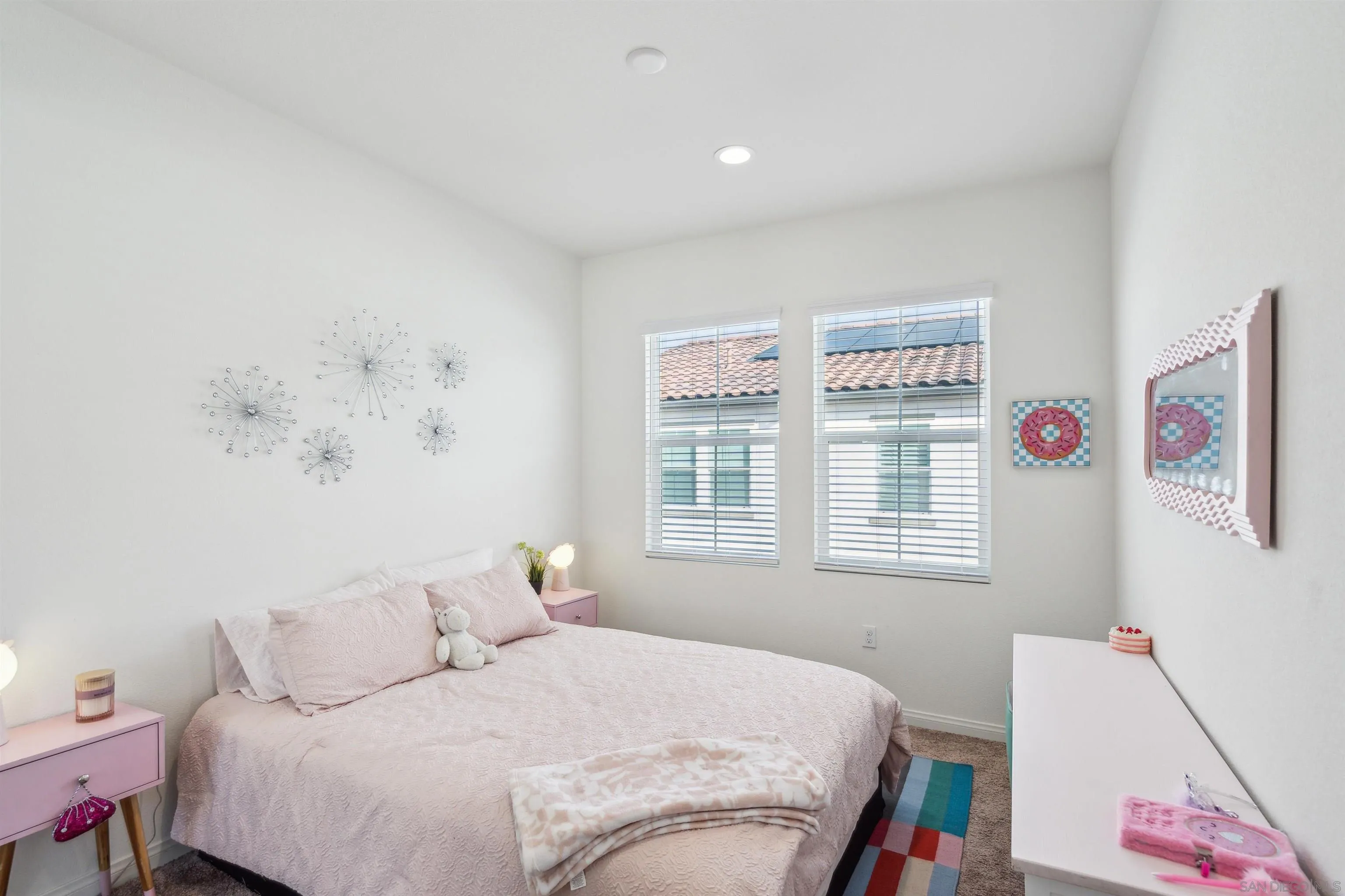 2018 Barite Street Spring Valley, CA 91977 - Photo 35 of 47 a bedroom with a bed and a window