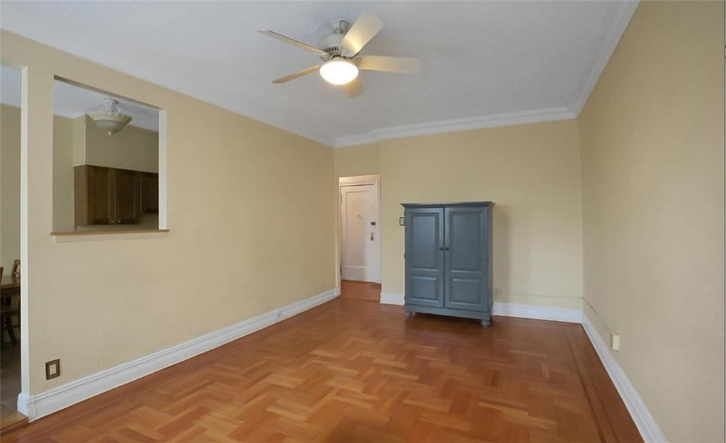 7101 Colonial Road, Unit R2B Brooklyn, NY 11209 - Photo 3 of 10 an empty room with closet and a ceiling fan