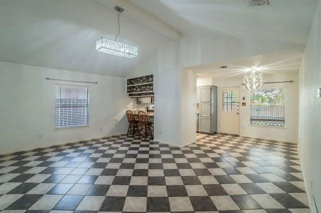 a view of a big room with a chandelier