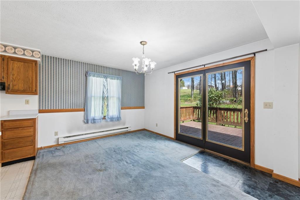136 Bottom Road Mill Run, PA 15464 - Photo 7 of 26 a view of an empty room with a window