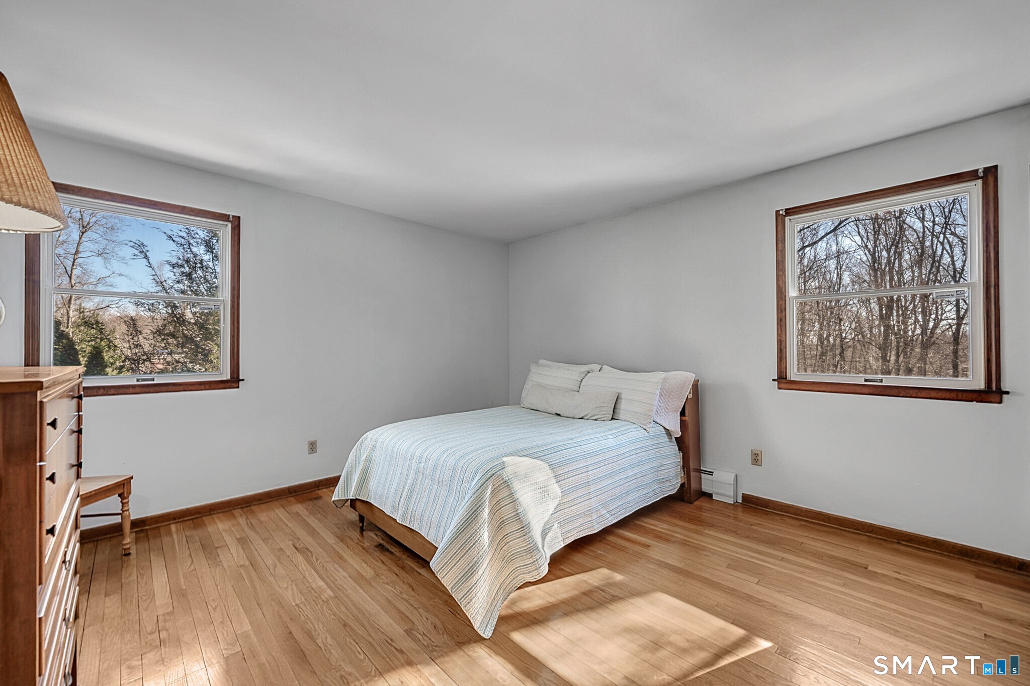 67 Hillside Lane Monroe, CT 06468 - Photo 19 of 40 Bedroom three has hardwood floors and large windows.