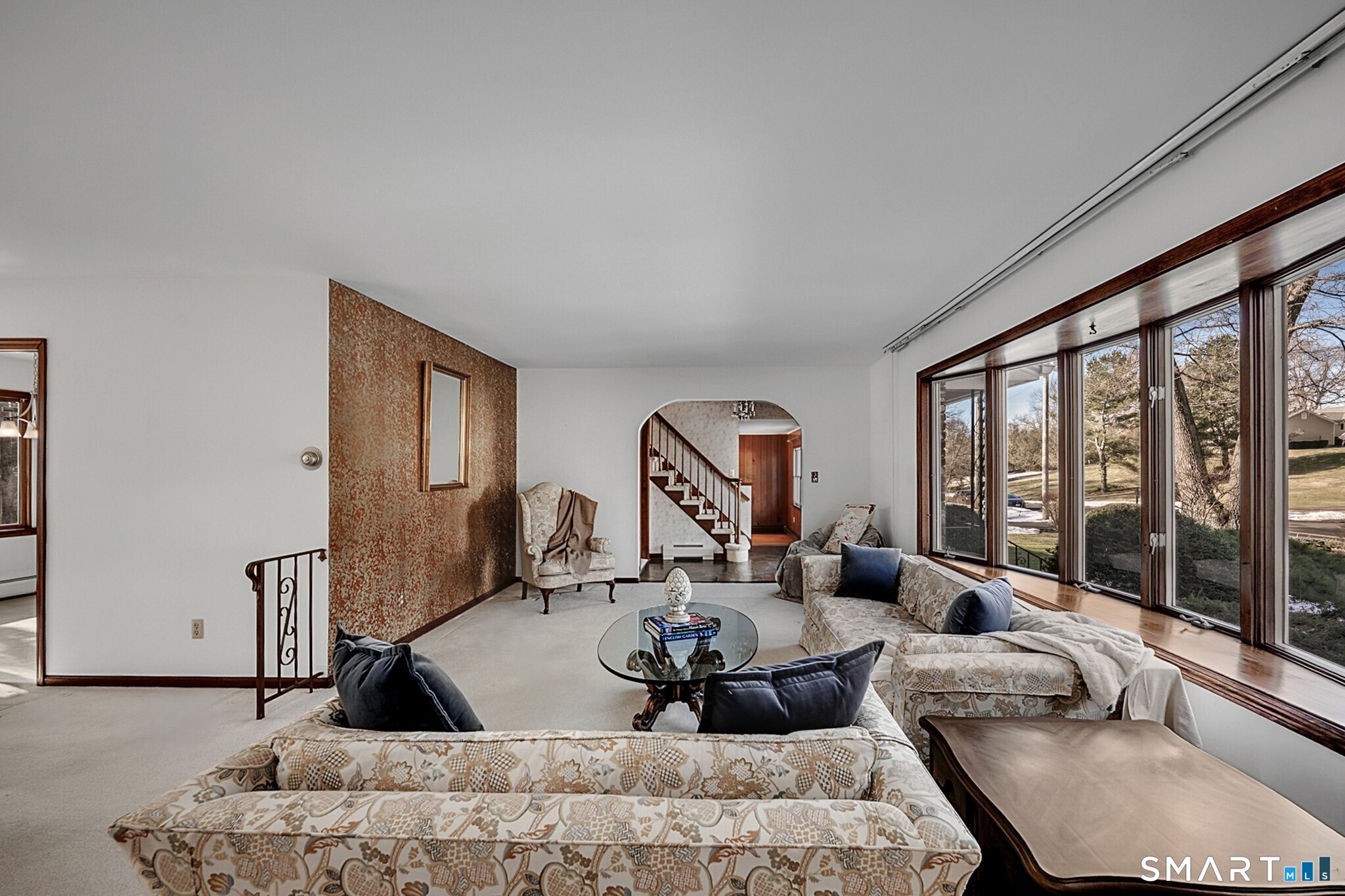 67 Hillside Lane Monroe, CT 06468 - Photo 6 of 40 The focal point of the room is a huge picture window, expertly positioned to allow tons of natural light.