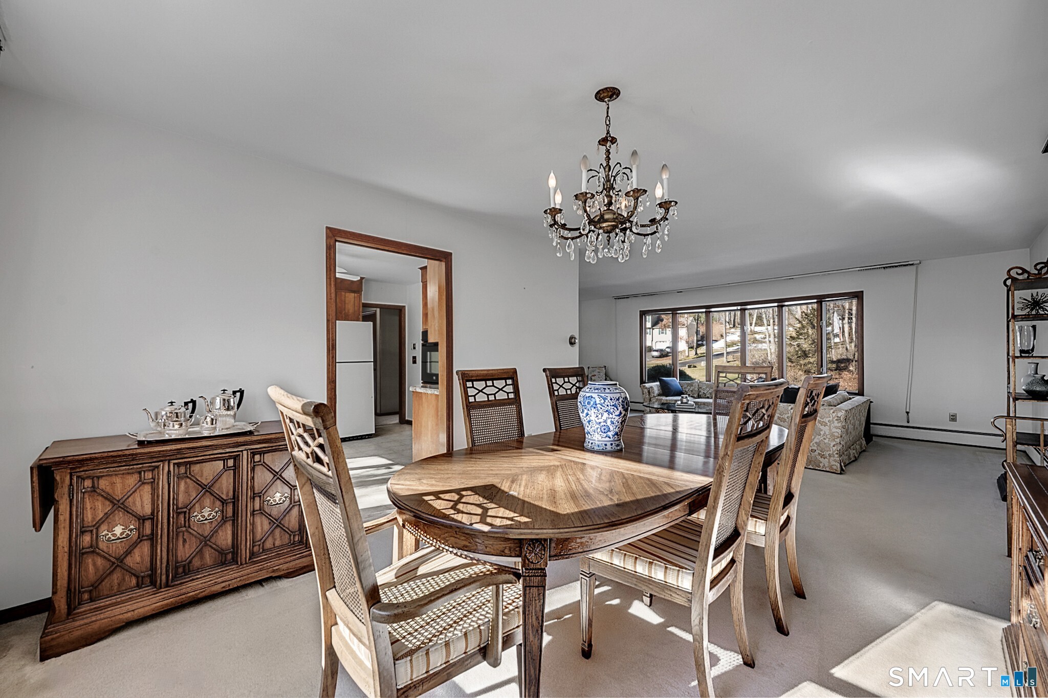 67 Hillside Lane Monroe, CT 06468 - Photo 7 of 40 The open layout of the living room and dining room seamlessly connects, great for entertaining.