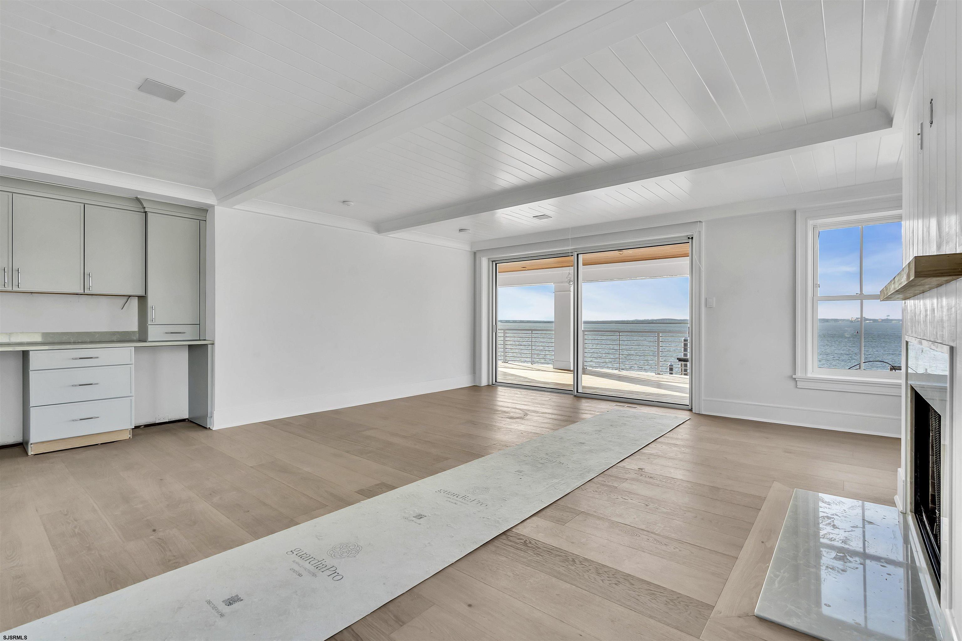 176-80 Bay Road Ocean City, NJ 08226 - Photo 16 of 58 a view of an empty room with a window