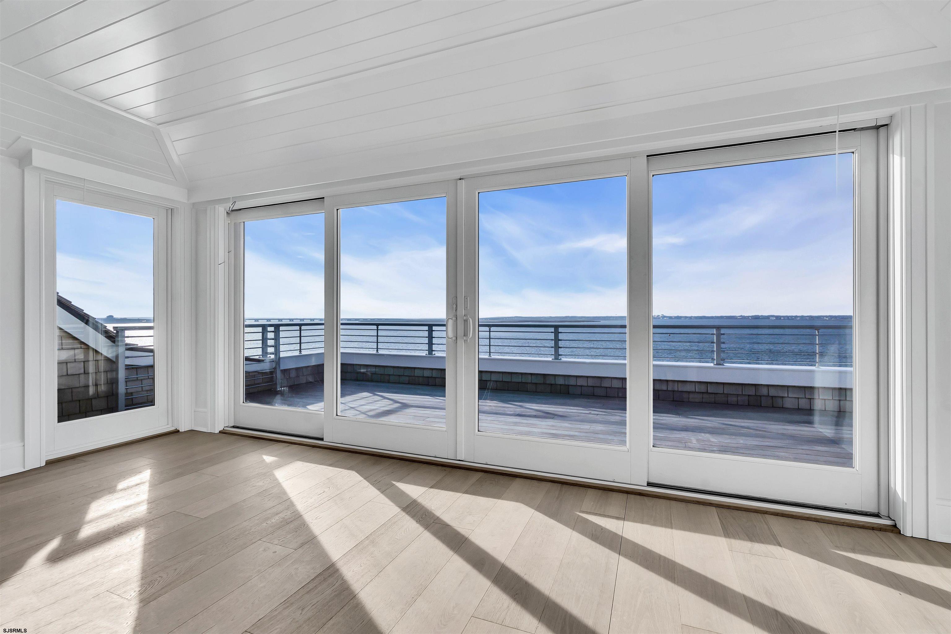 176-80 Bay Road Ocean City, NJ 08226 - Photo 23 of 58 a view of an empty room with a window