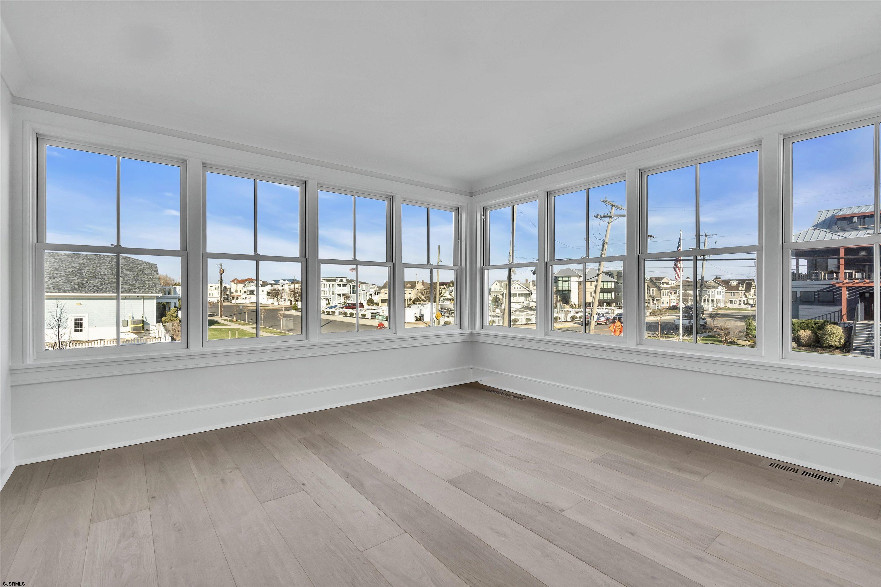 176-80 Bay Road Ocean City, NJ 08226 - Photo 31 of 58 a view of an empty room with a window