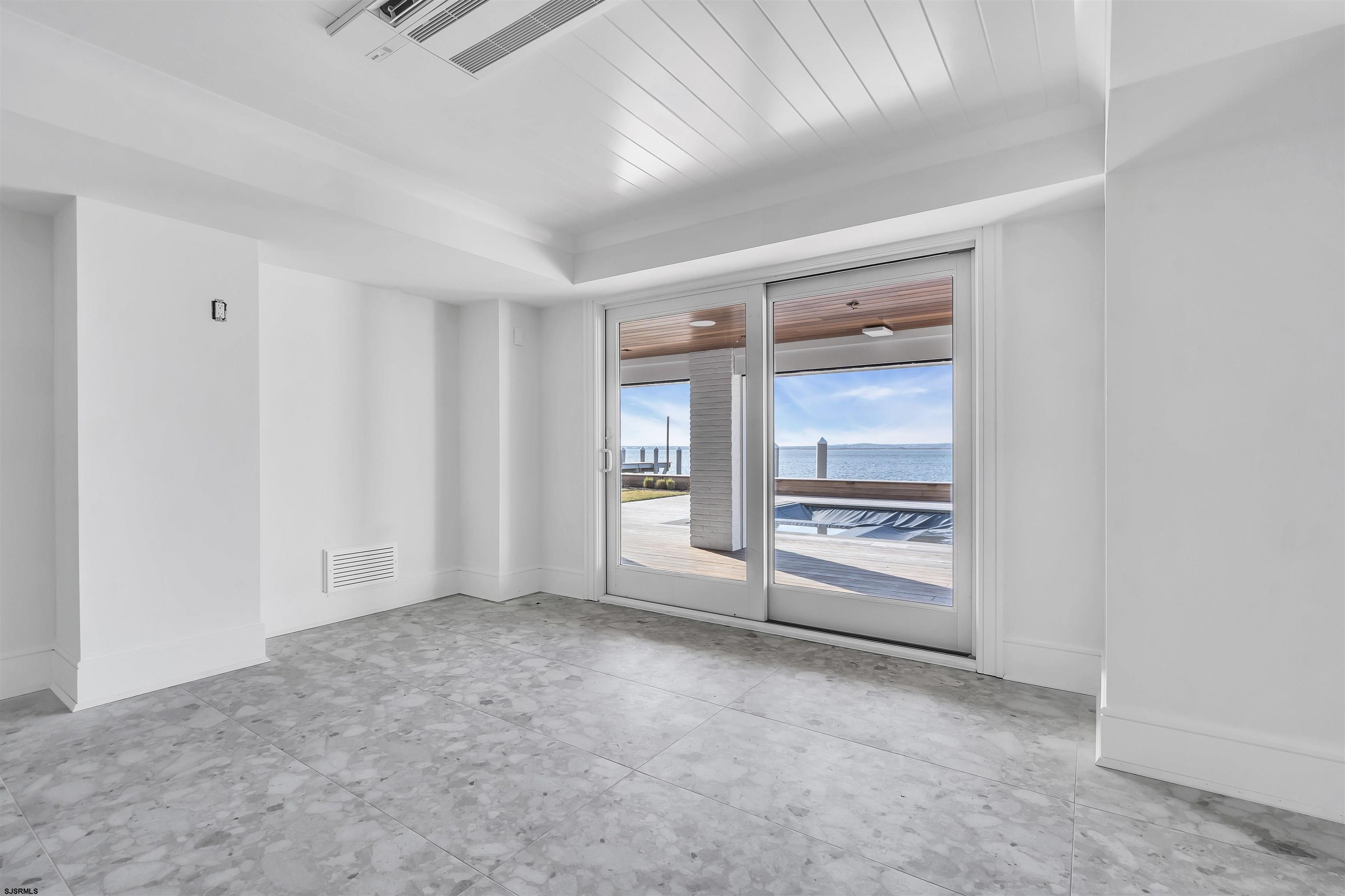 176-80 Bay Road Ocean City, NJ 08226 - Photo 37 of 58 a view of an empty room with a window