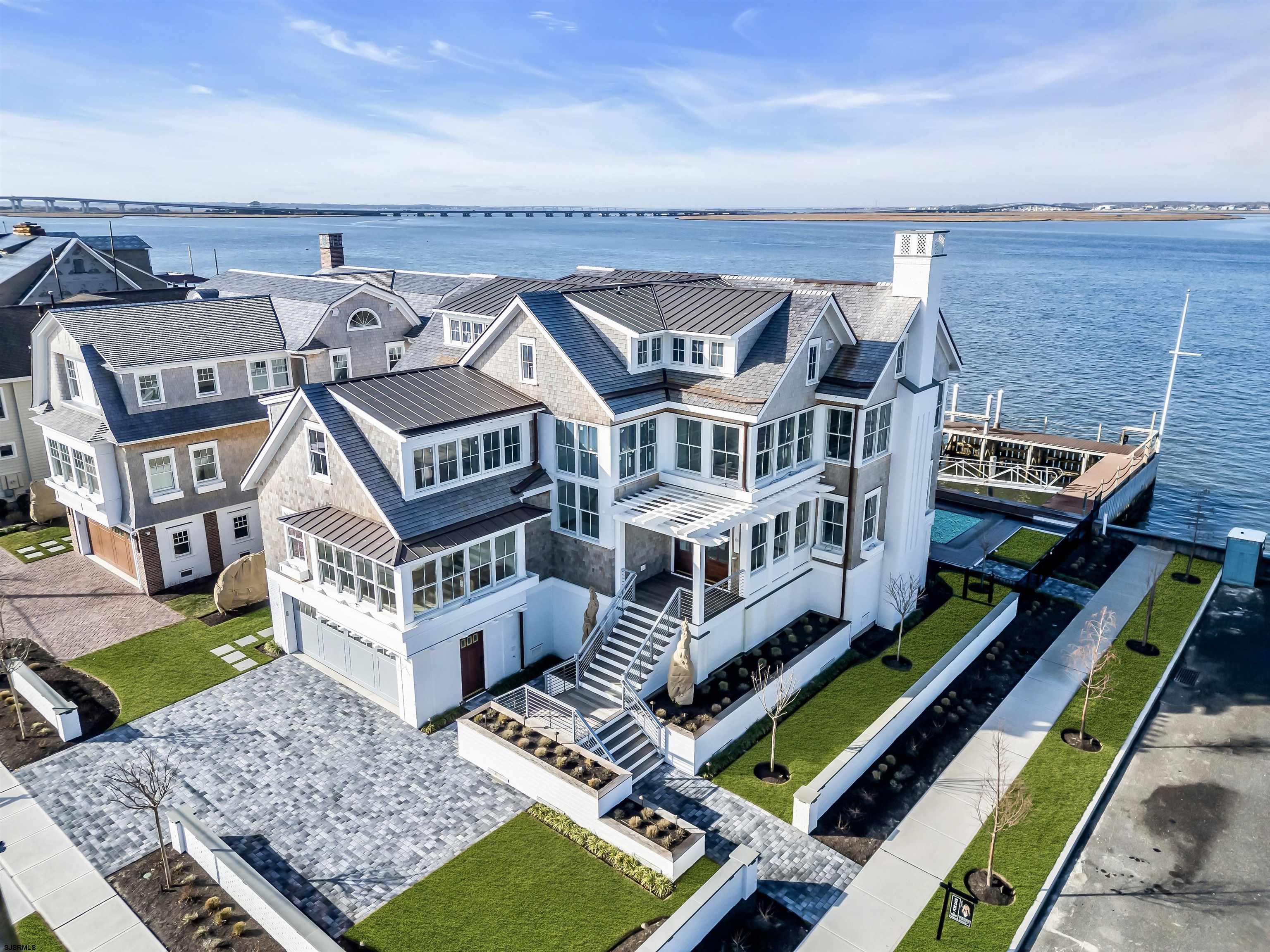 176-80 Bay Road Ocean City, NJ 08226 - Photo 41 of 58 an aerial view of a house with a backyard