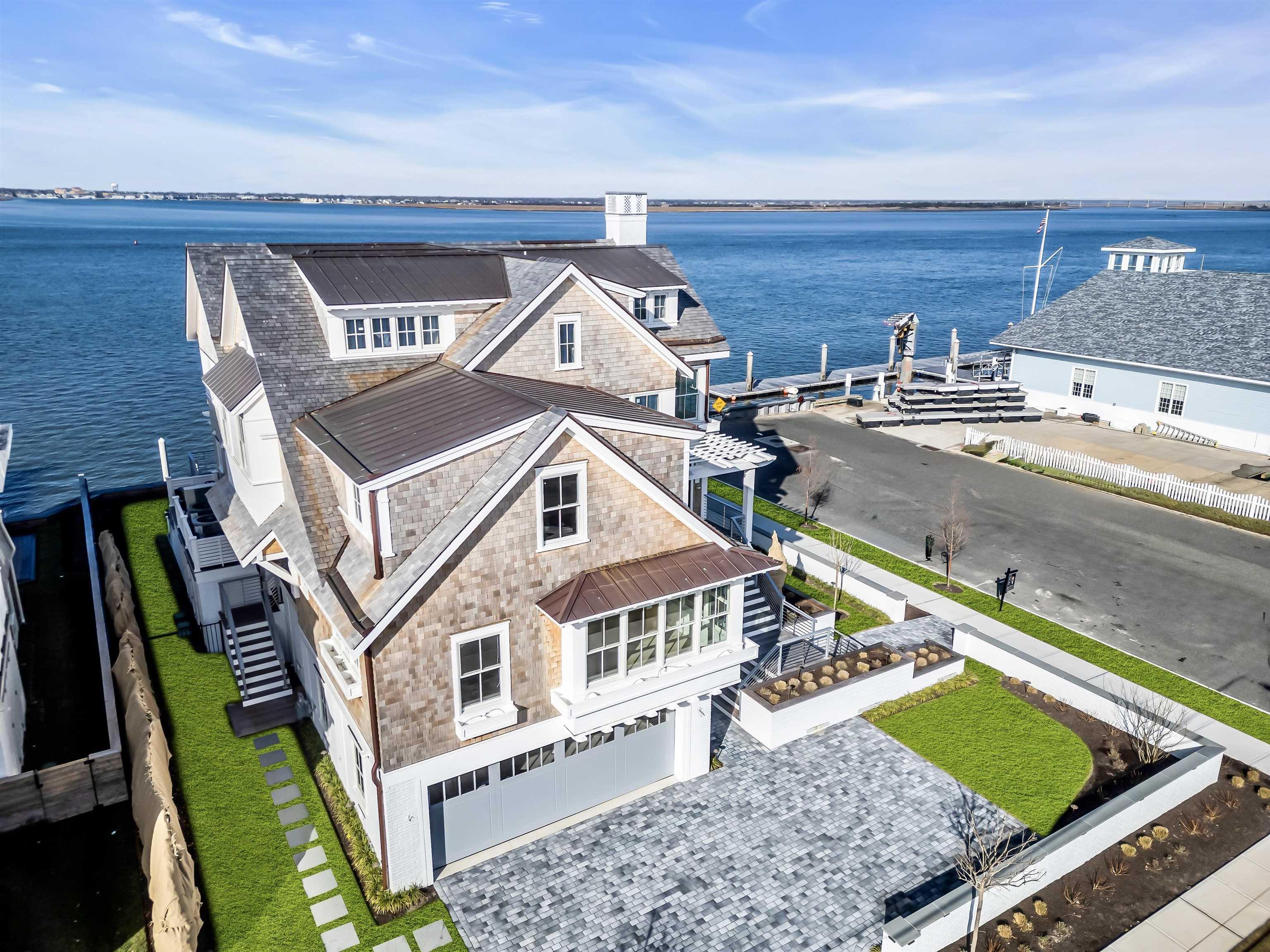 176-80 Bay Road Ocean City, NJ 08226 - Photo 48 of 58 a aerial view of a house with a swimming pool