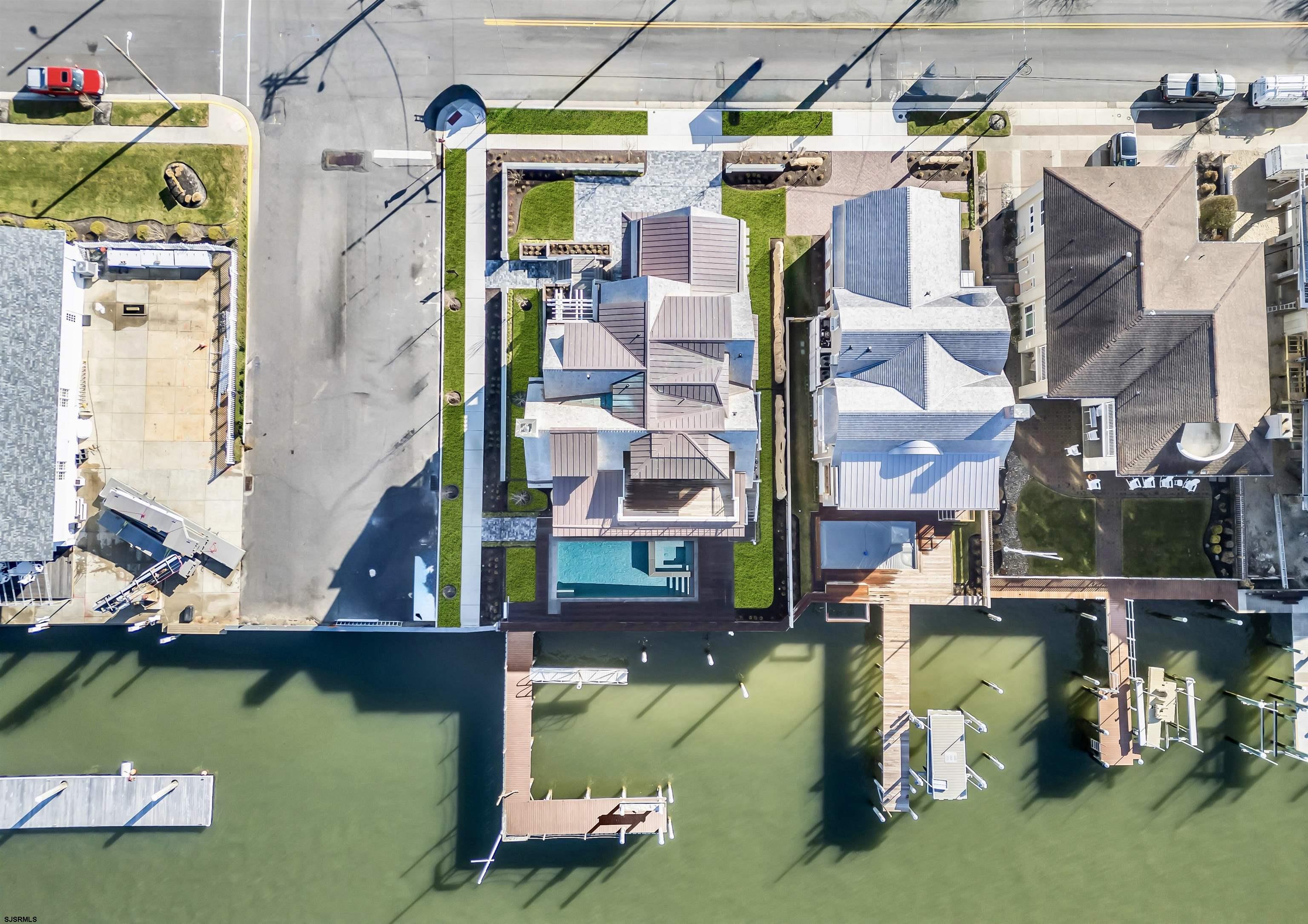 176-80 Bay Road Ocean City, NJ 08226 - Photo 53 of 58 a view of houses with swimming pool