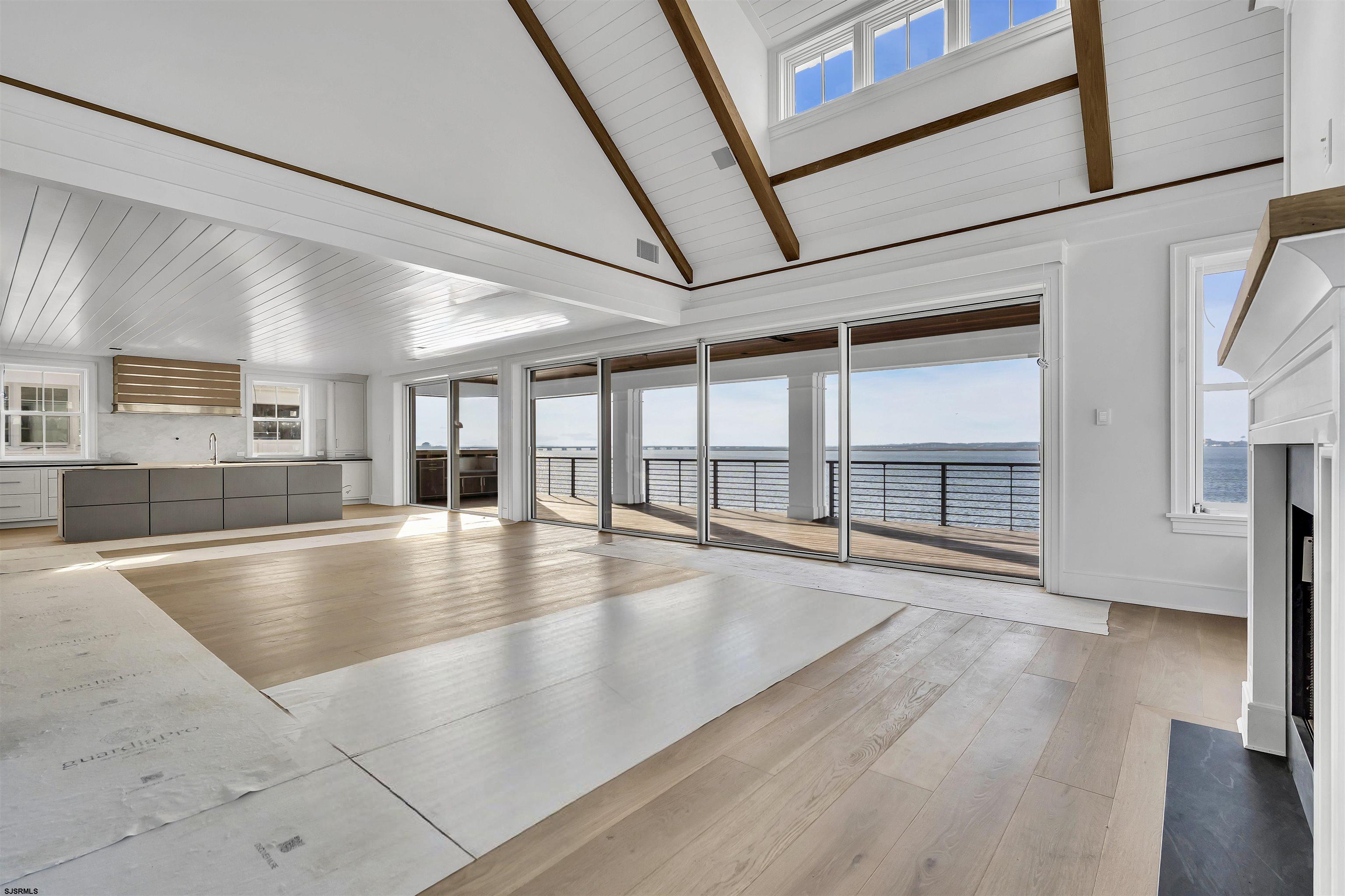 176-80 Bay Road Ocean City, NJ 08226 - Photo 8 of 58 a view of an entryway with wooden floor