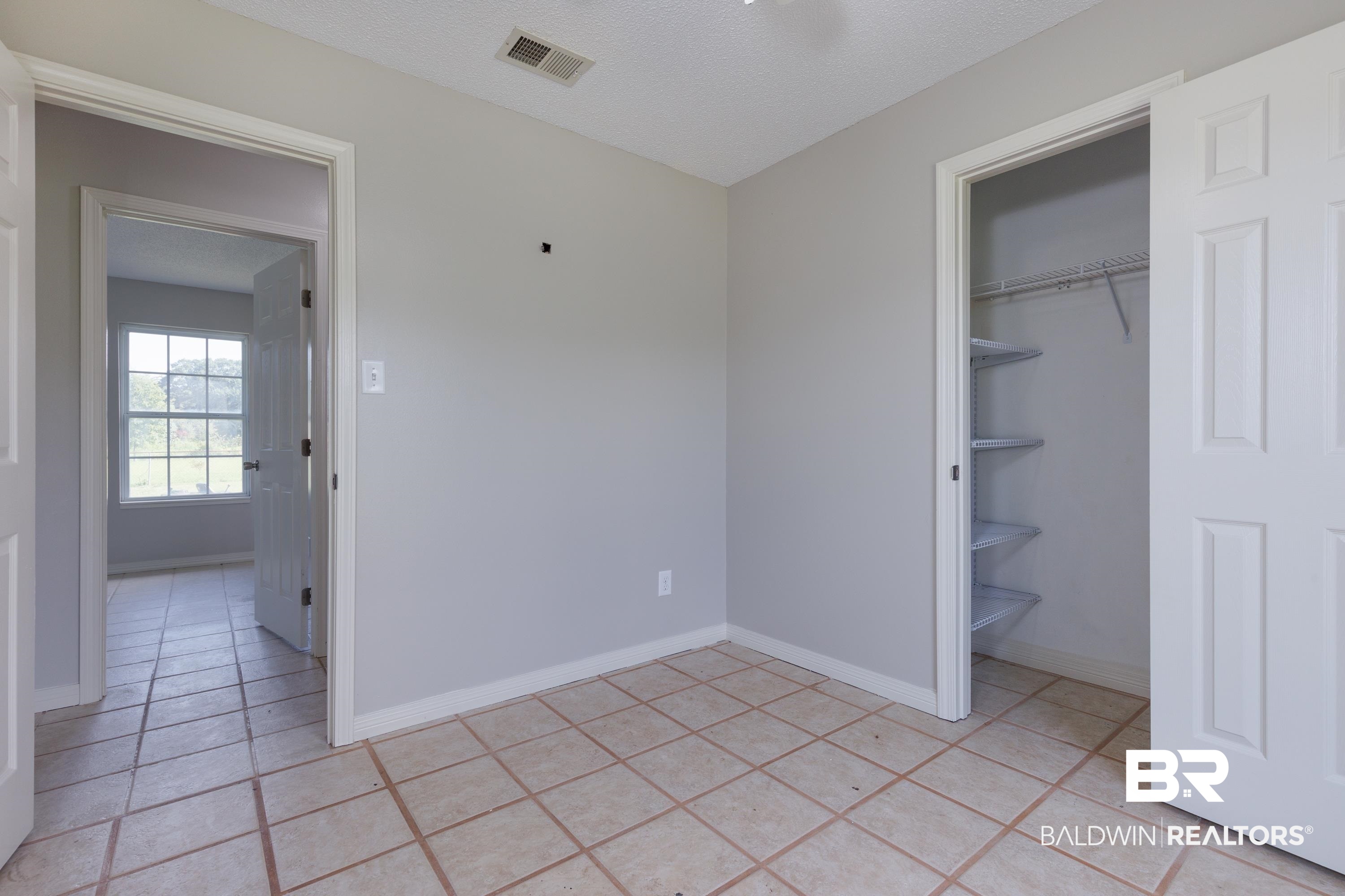 10841 Bennett Road North Grand Bay, AL 36541 - Photo 13 of 18 Bedroom w Walk in Closet