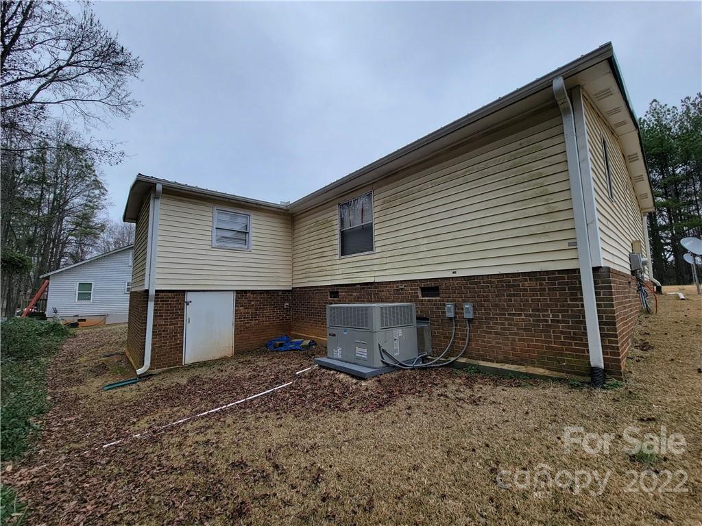 231 Bud Black Road Crouse, NC 28033 - Photo 15 of 18 front view of a house with a yard and garage