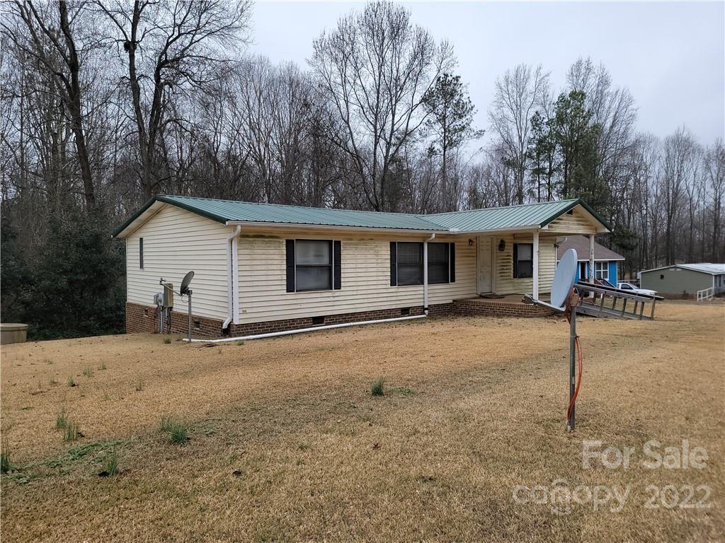 231 Bud Black Road Crouse, NC 28033 - Photo 2 of 18 a view of a house with a yard covered in snow