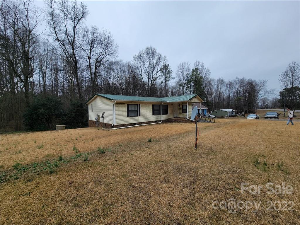 231 Bud Black Road Crouse, NC 28033 - Photo 4 of 18 a house with trees in the background