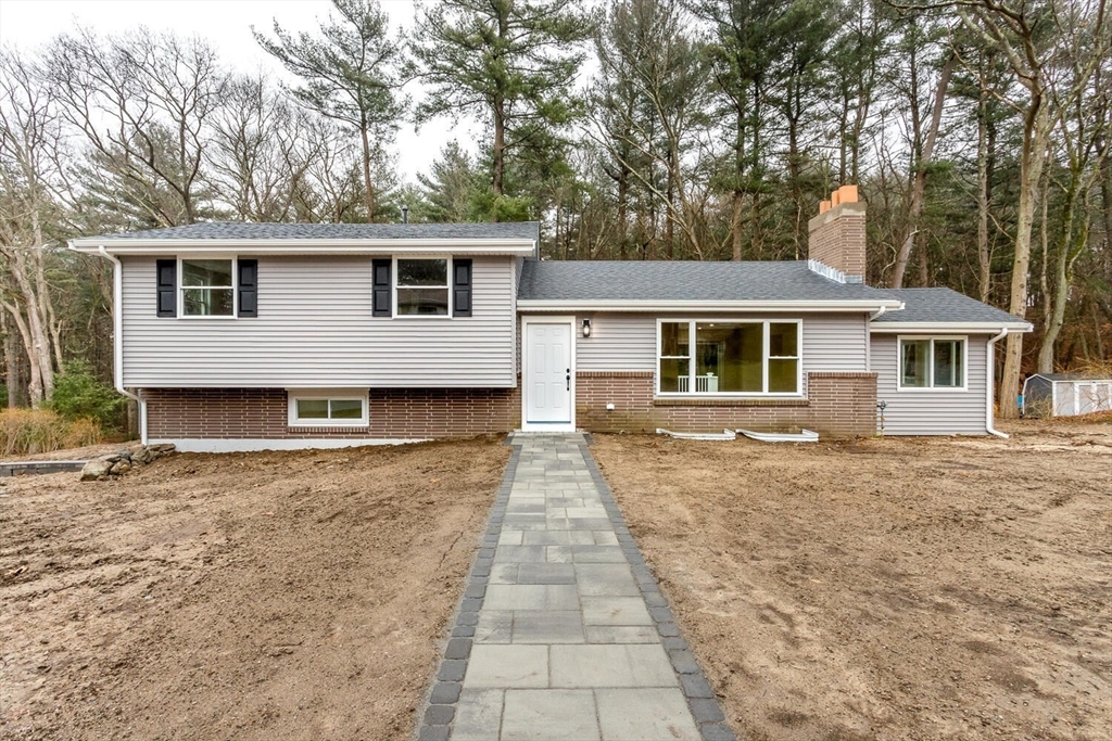 71 Morton Street Canton, MA 02021 - Photo 2 of 39 a front view of a house with yard