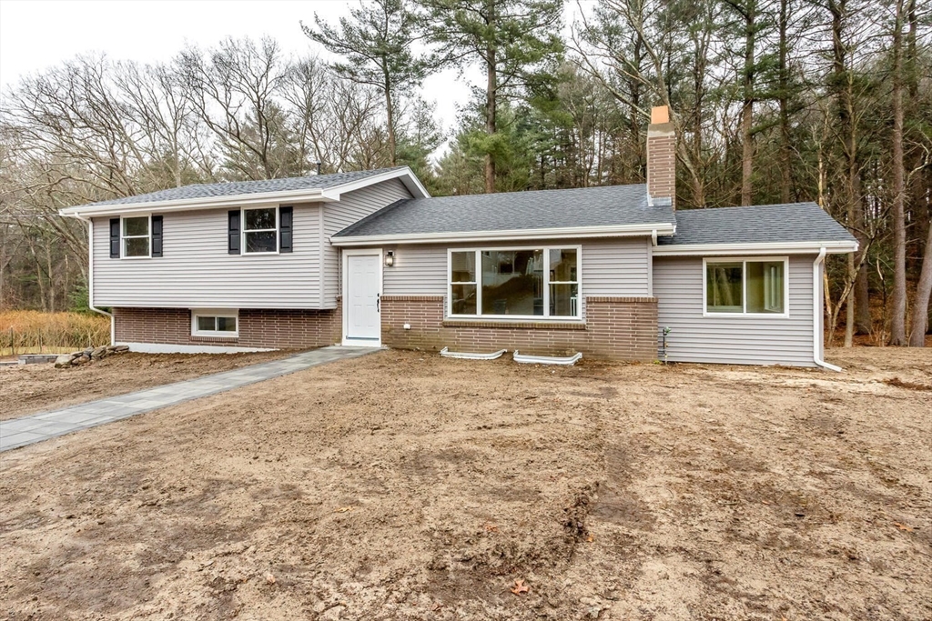 71 Morton Street Canton, MA 02021 - Photo 3 of 39 front view of a house with a yard