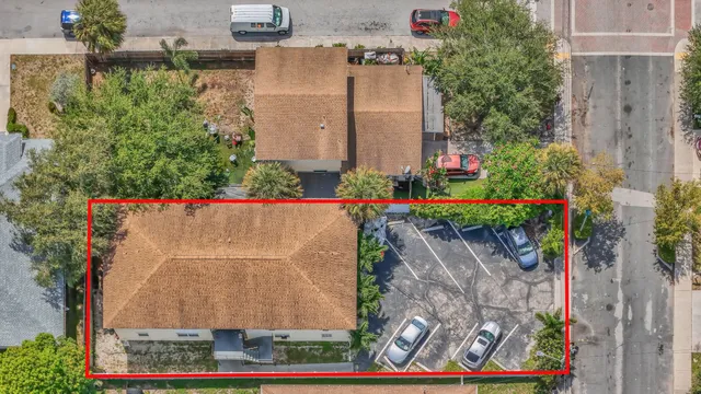 a car parked in front of a house