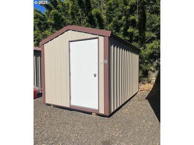 a view of a wooden door in front of a house