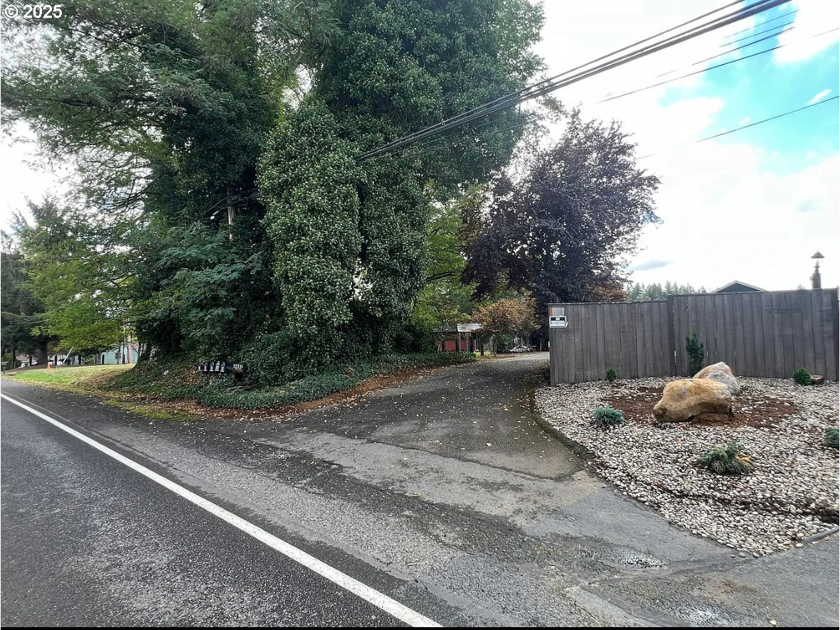 8031 Southeast Orient Drive Gresham, OR 97080 - Photo 2 of 17 a backyard of a house with lots of green space