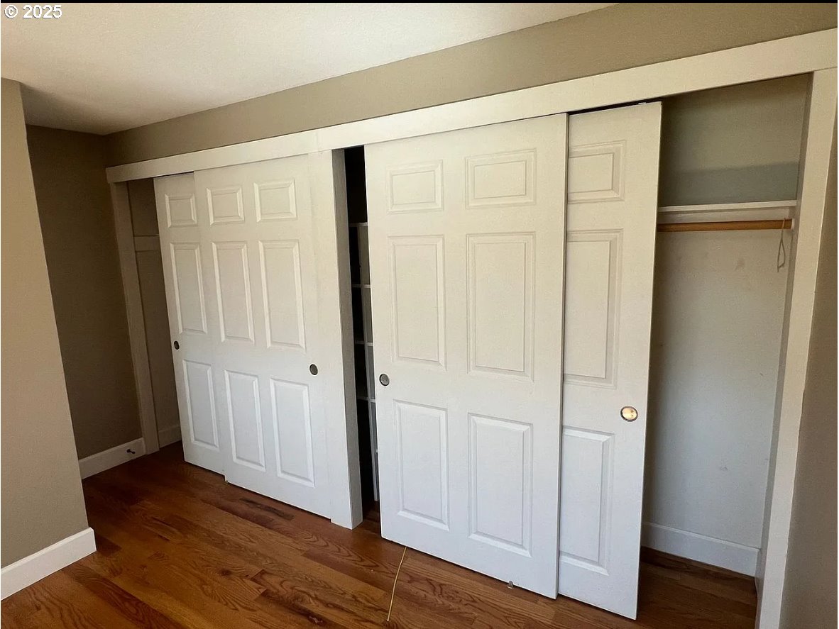 8031 Southeast Orient Drive Gresham, OR 97080 - Photo 8 of 17 a view of empty room with wooden floor