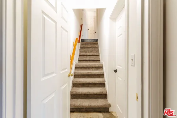 a view of an entryway with stairs