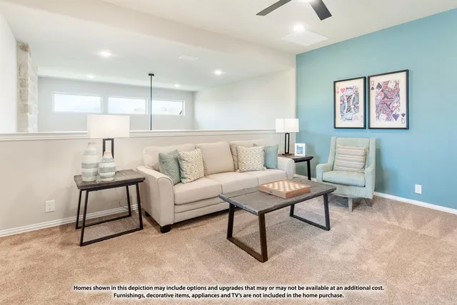 a living room with furniture and a rug