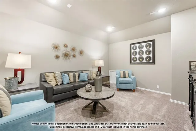 a living room with furniture and a rug