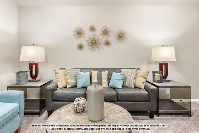 a living room with furniture and a lamp