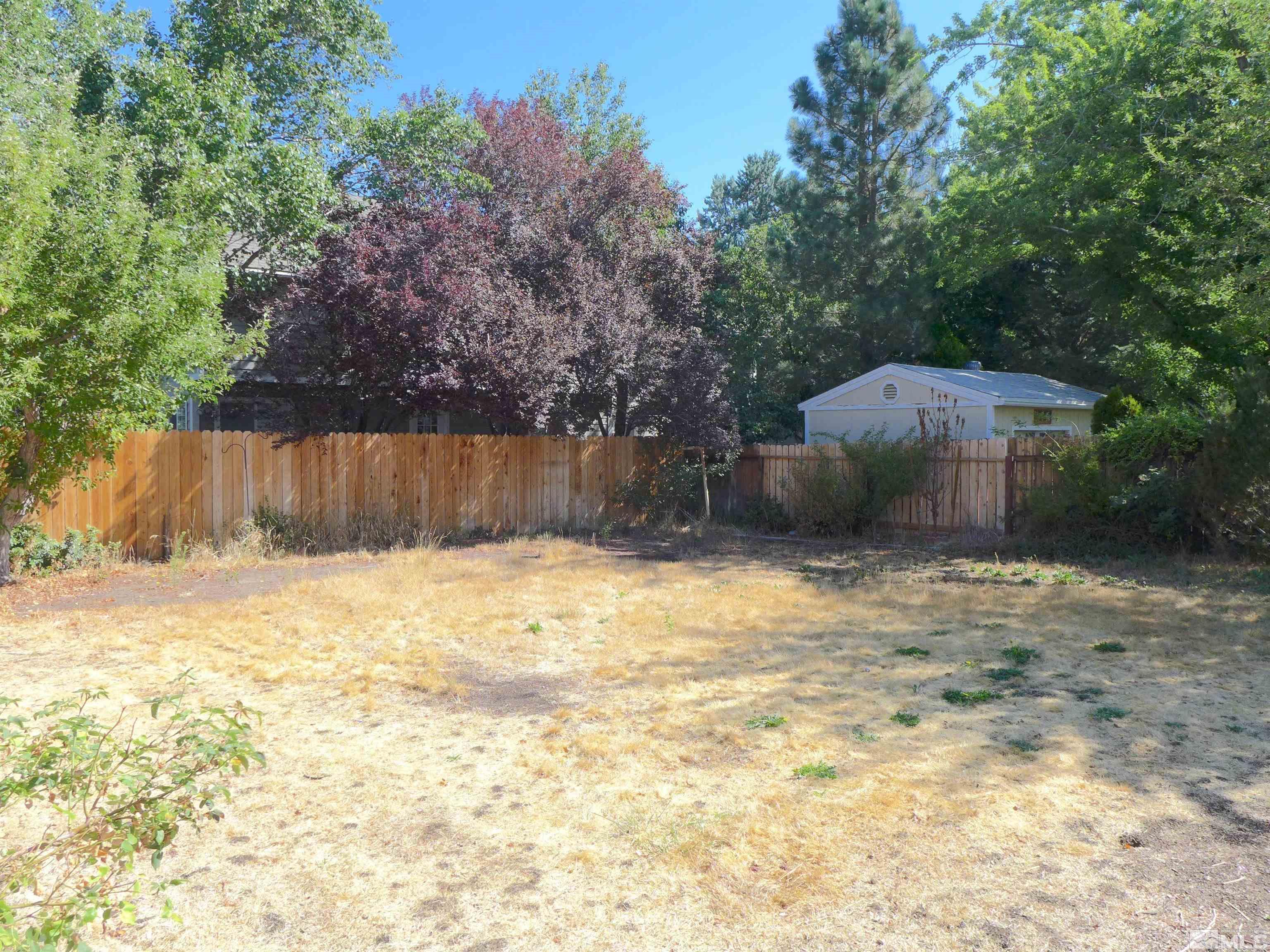 1285 Tacoma Way Reno, NV 89509 - Photo 6 of 10 a backyard of a house with lots of green space